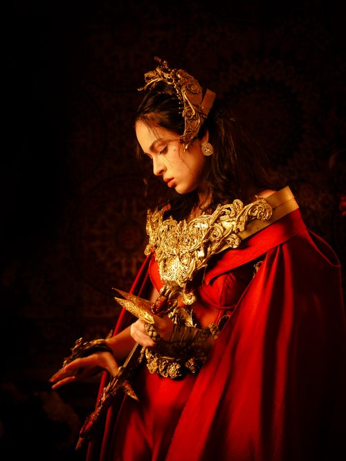 Free Artistic portrait of a woman in traditional Indonesian attire with intricate details. Stock Photo
