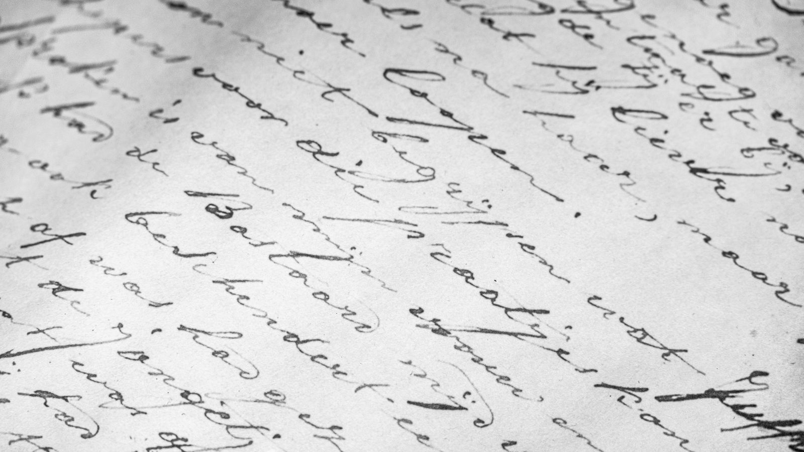 A close-up of handwritten cursive text on paper