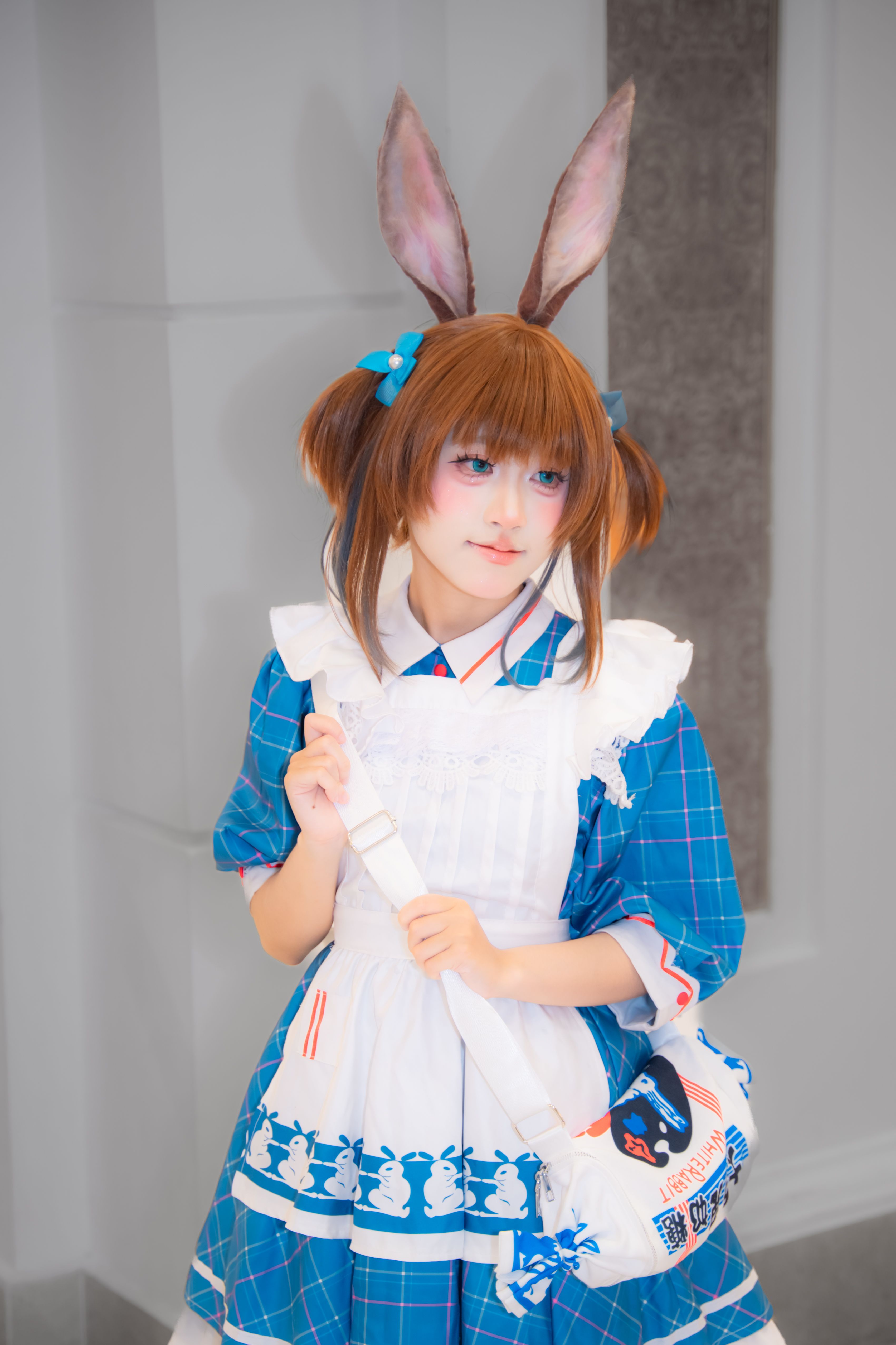 Cosplay Character in Blue and White Costume
