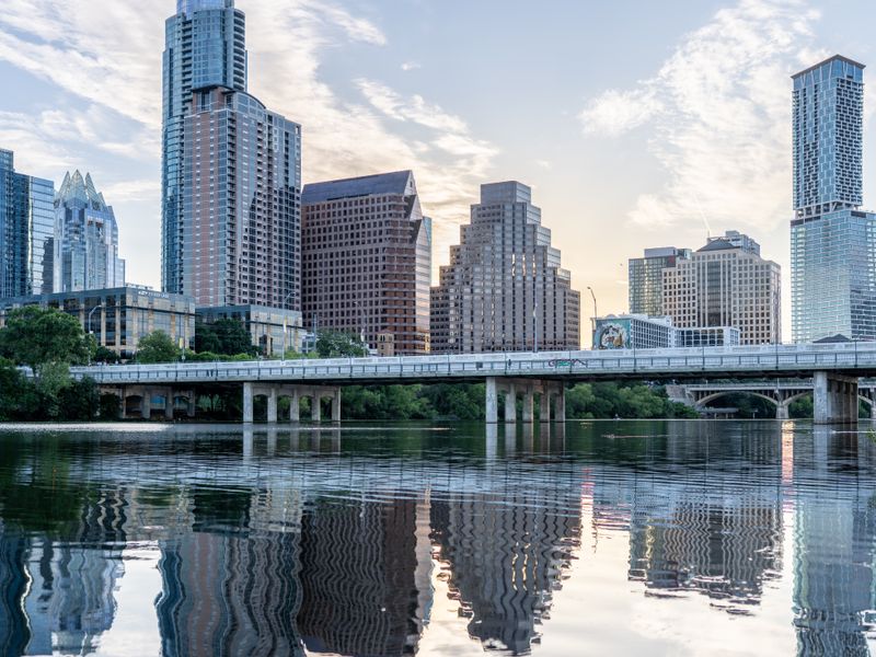 Austin skyline reflected in Lady Bird Lake on a clear day
