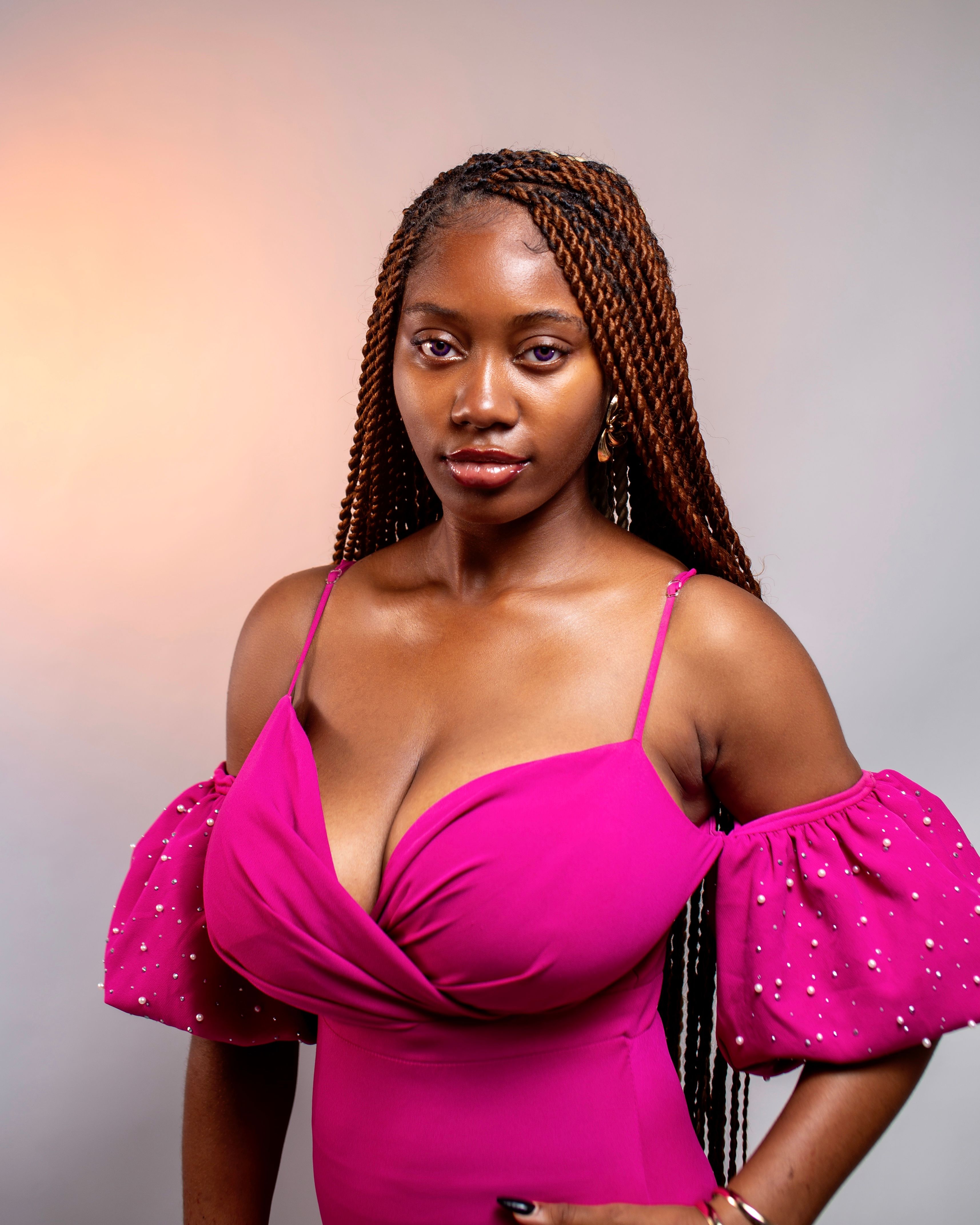 Elegant Portrait of a Woman in Pink Dress · Free Stock Photo
