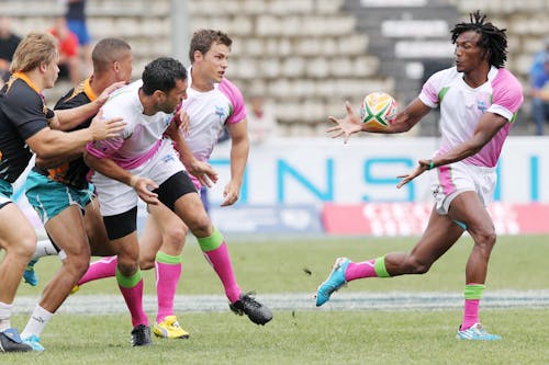 Group of People Playing Rugby