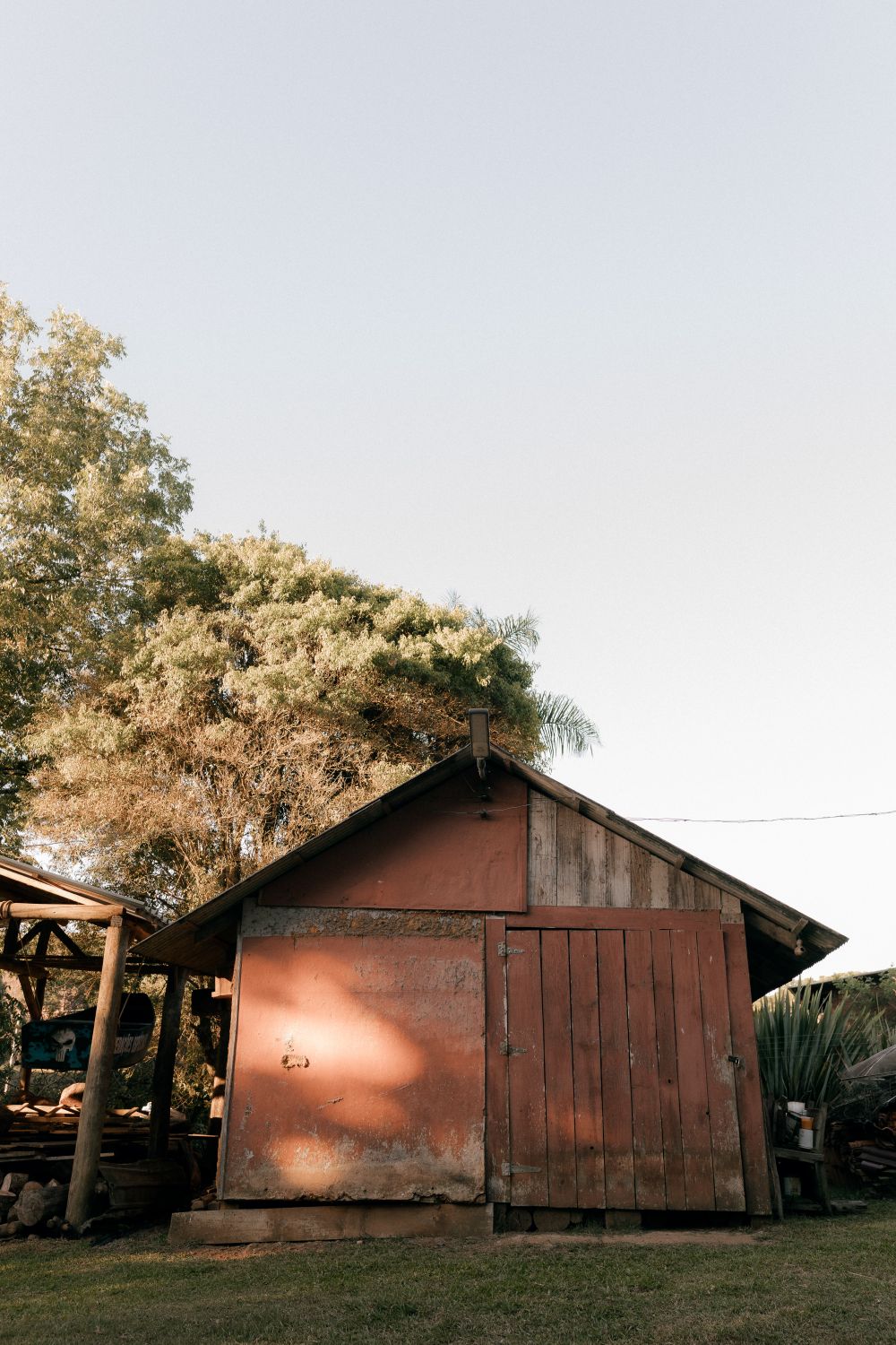 Rustic Wooden Shed in Rural Landscape · Free Stock Photo