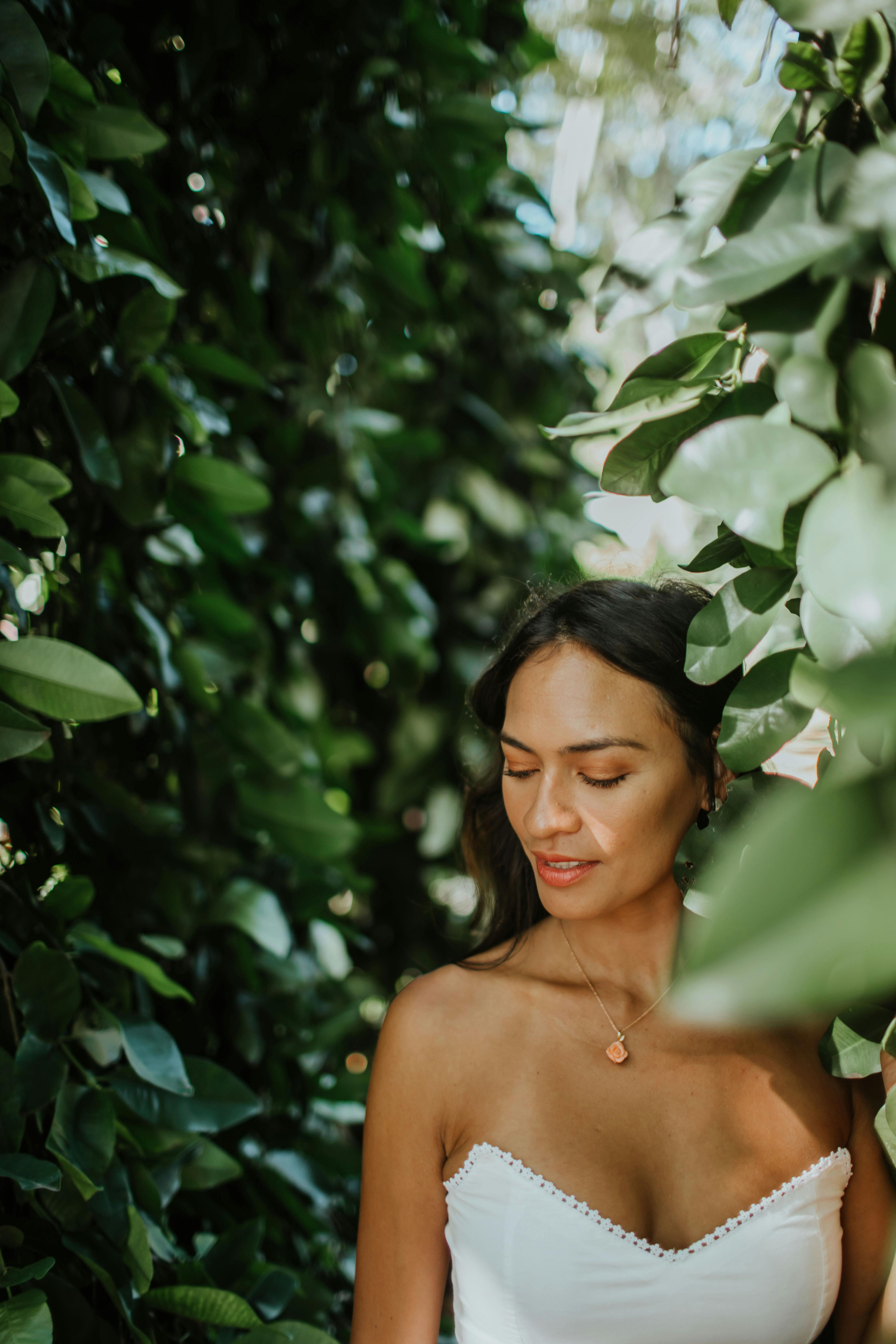 Topless Woman Standing Under Green Tree · Free Stock Photo