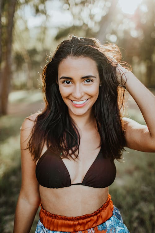 Woman In Black Bikini Top Smiling