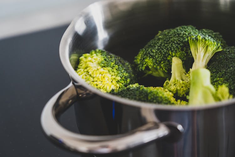 Green Broccoli In Stainless Steel Cooking Pot