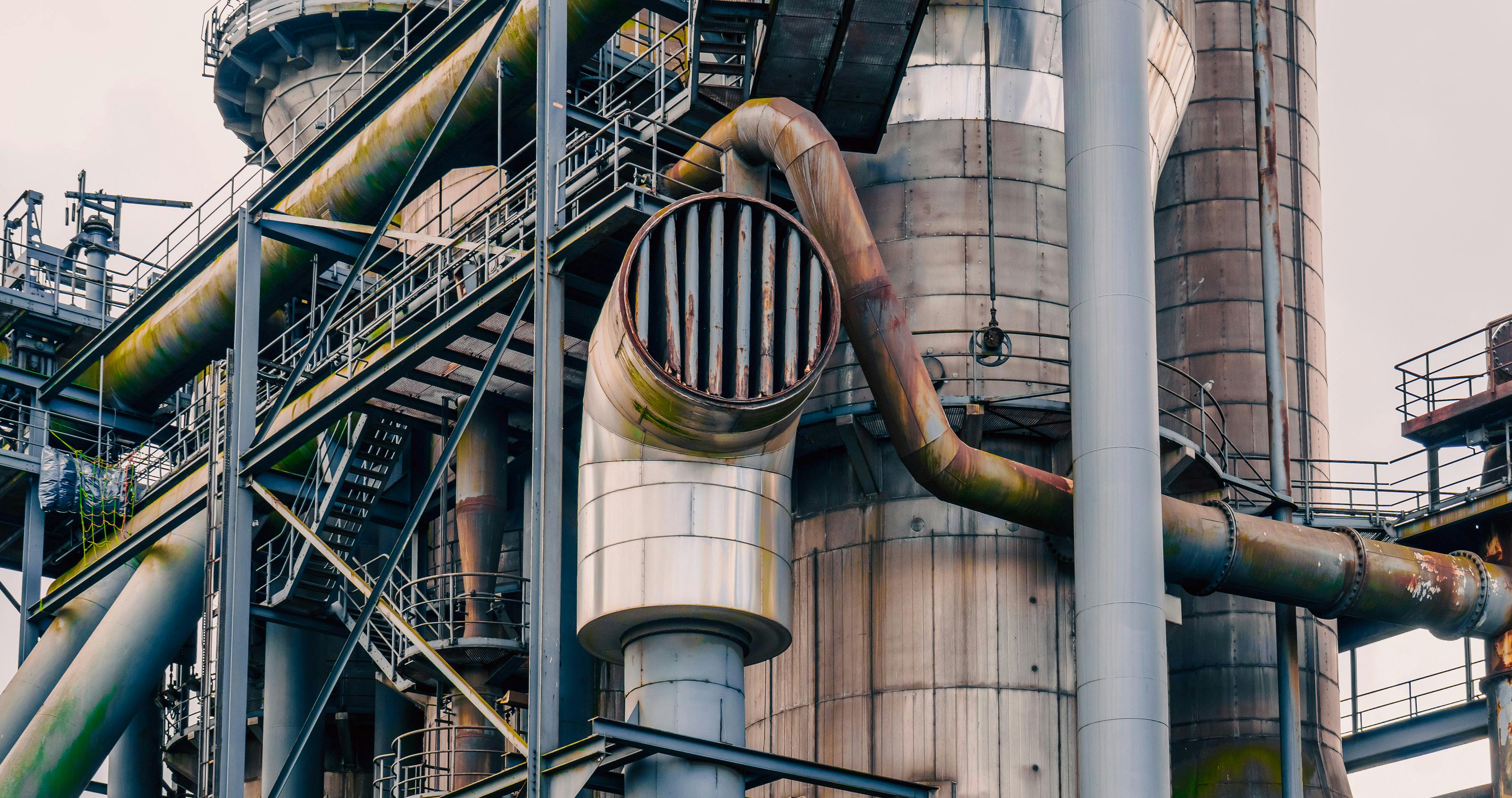 The Reshoring of Commercial Equipment Manufacturing: What It Means for Transit and Fleet Operations — Photo by Jakub Zerdzick