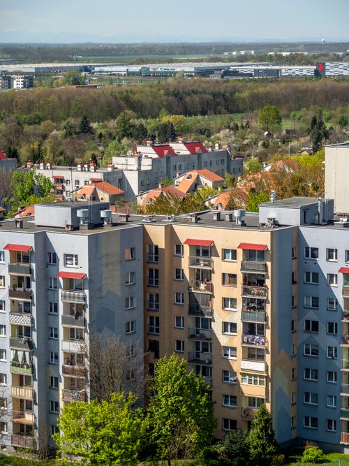 Free Aerial view of residential buildings and landscape in Wrocław, Poland on a sunny day. Stock Photo