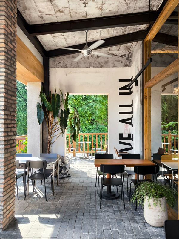 Modern open-air cafe with rustic decor