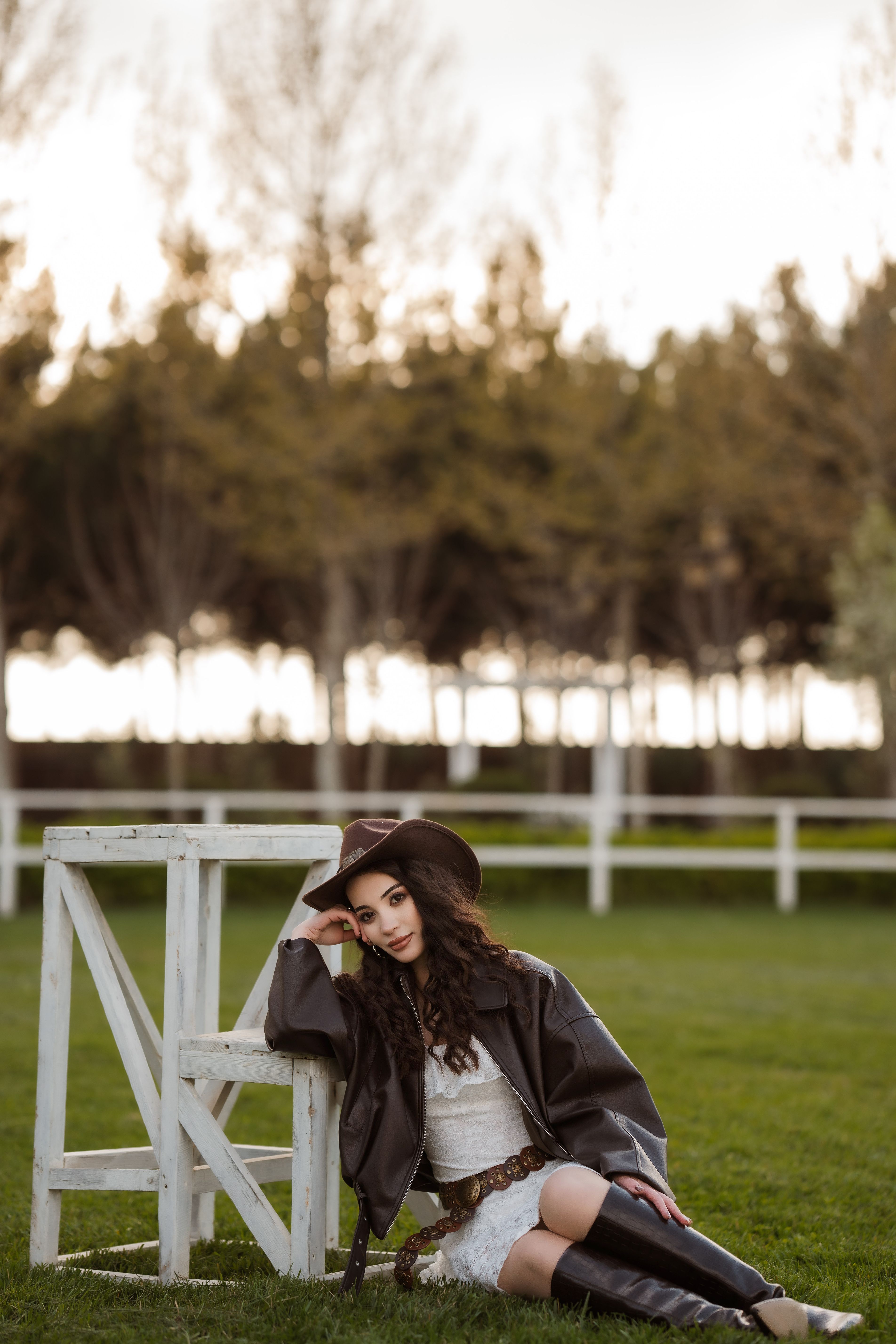 Stylish Woman Posing Outdoors in Baku Park · Free Stock Photo