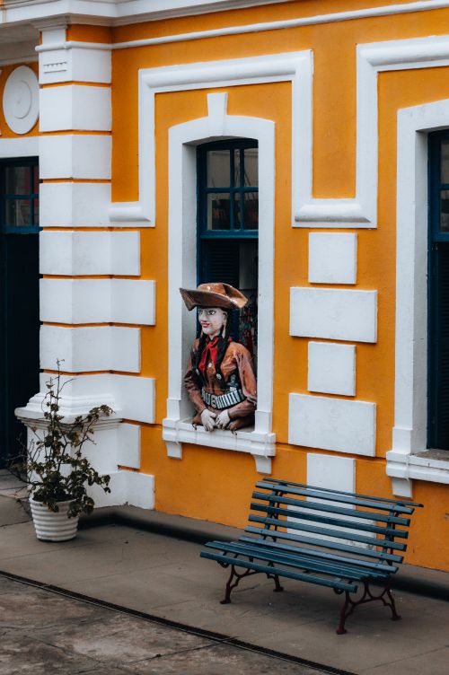 Free Colorful colonial building facade with unique window decoration in Natal, Brazil. Stock Photo