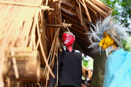 Free Colorful traditional puppets on display during a sunny day in West Java, Indonesia. Stock Photo
