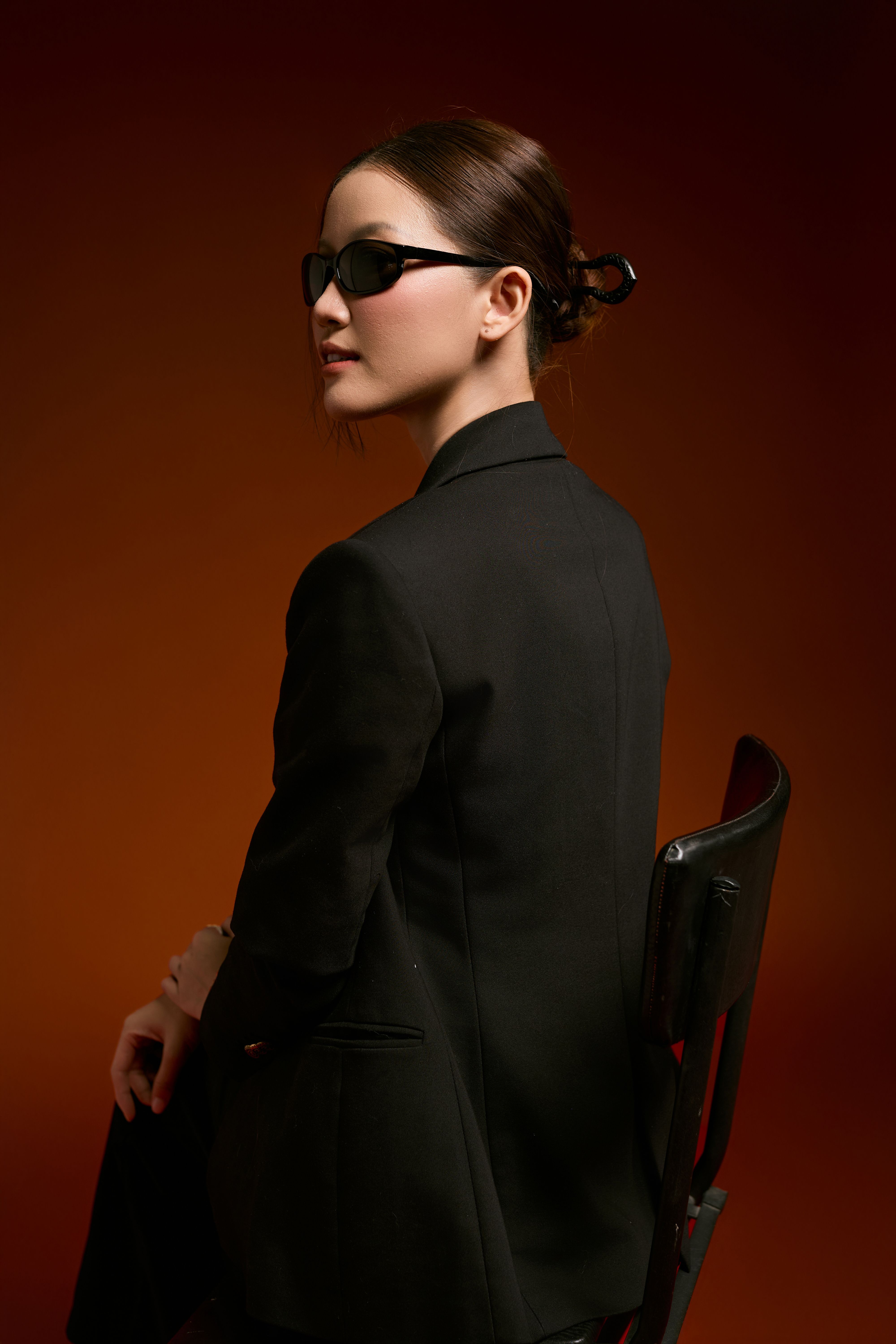 Elegant Woman in Black Jacket with Sunglasses · Free Stock Photo