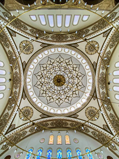 Free Intricate dome and stained glass windows in a Konya mosque, showcasing Islamic art. Stock Photo