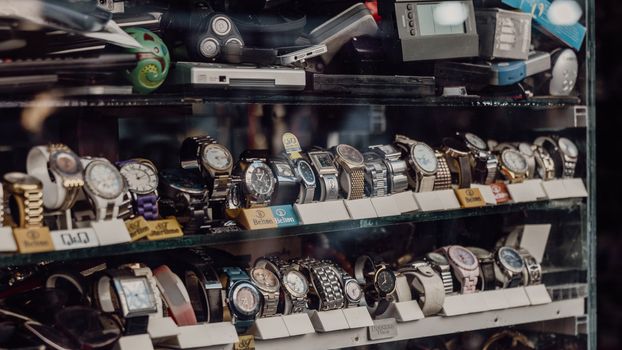 A variety of watches displayed in a shop in Istanbul, showcasing diverse brands and styles.