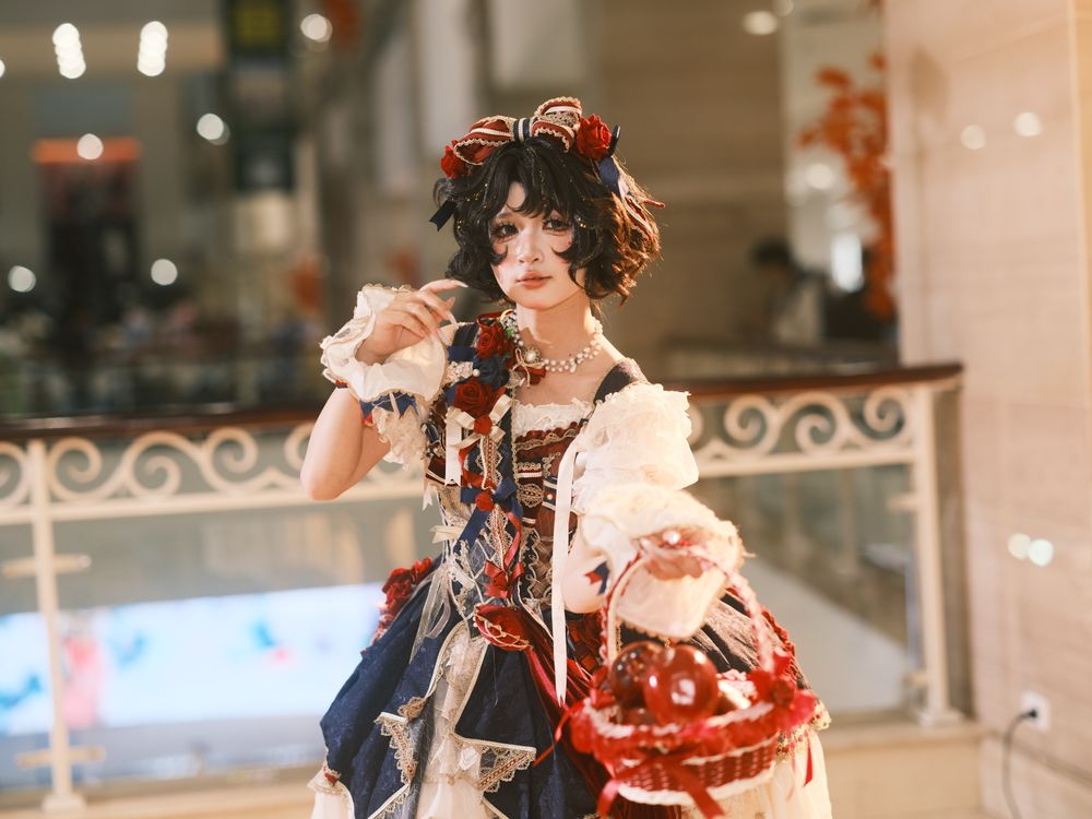 Retro Cosplayer Cosplayer in Elegant Antique Costume Holding Fruit Basket · Free Stock ...