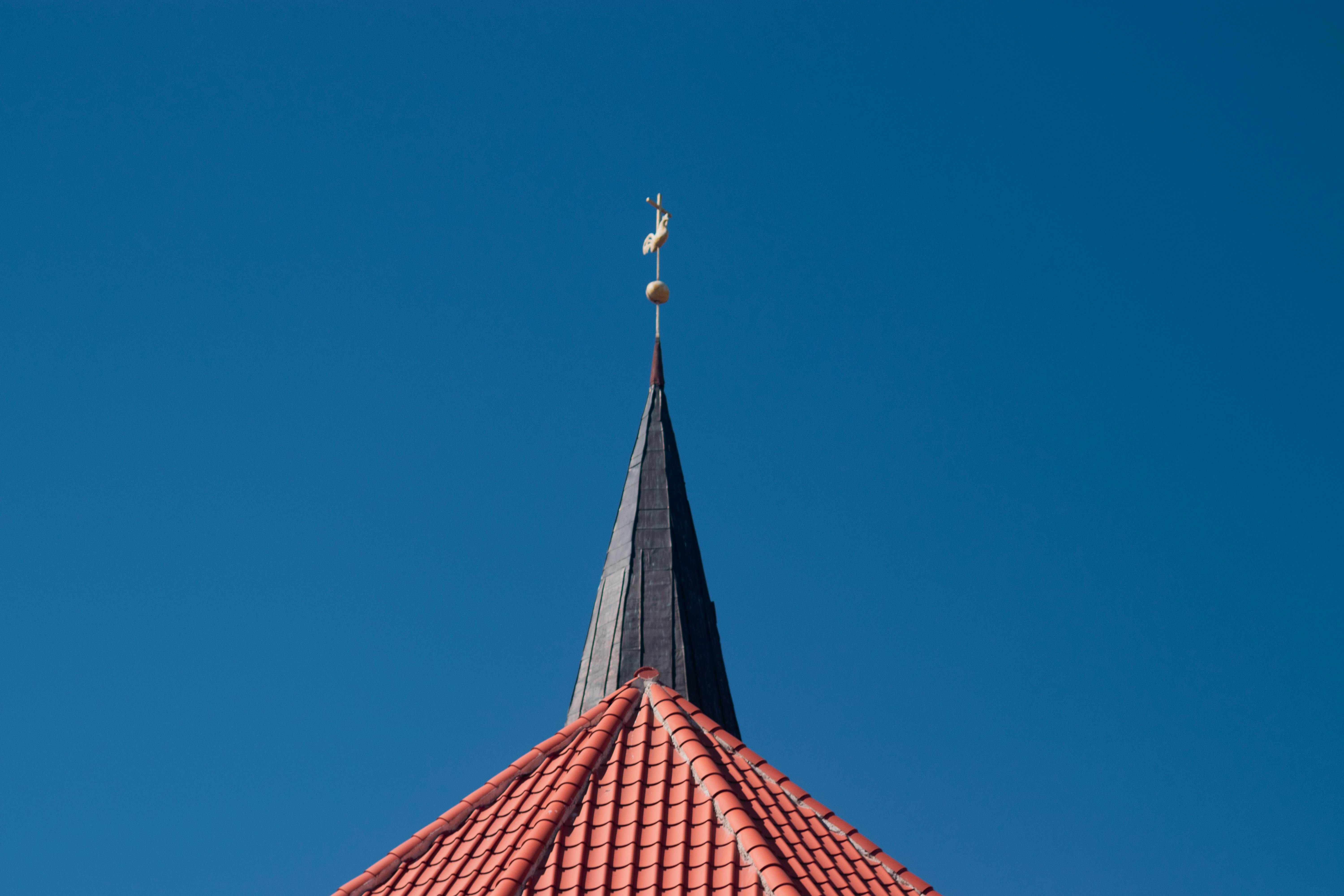 close-up of red-roofed building near Christ Embassy Ho Loveworld Arena