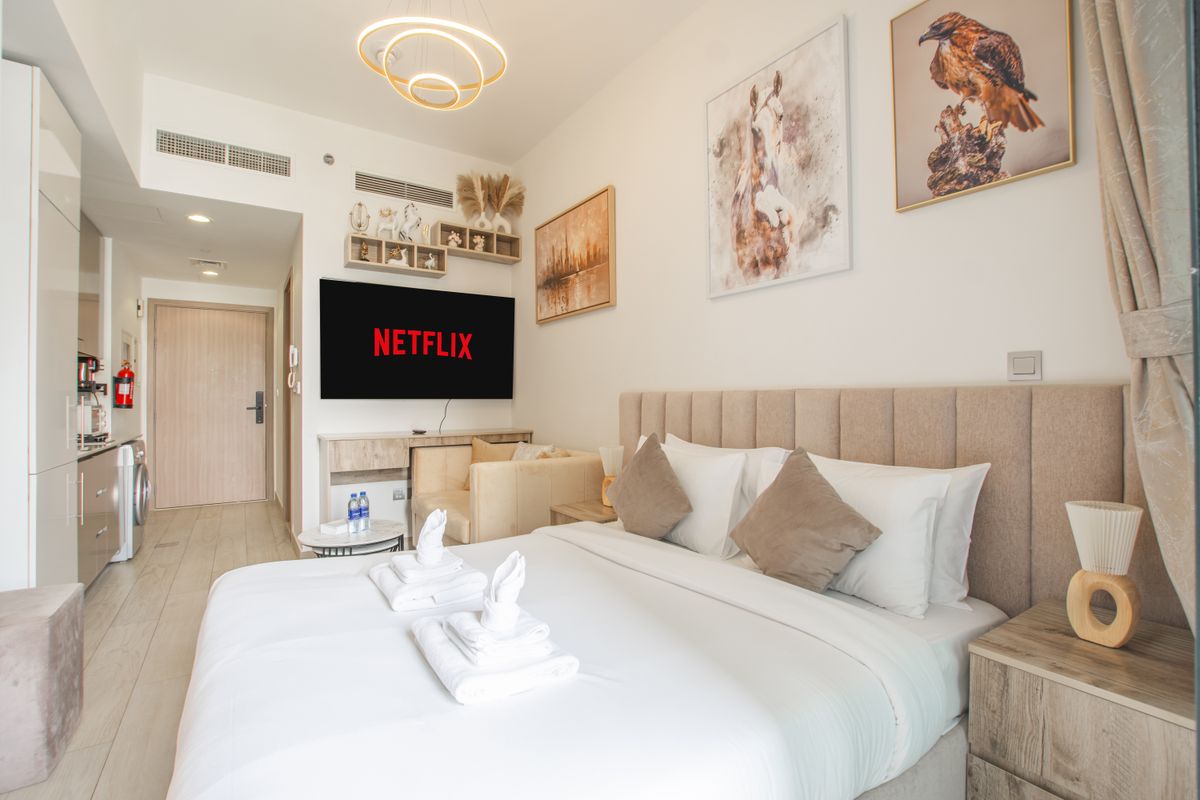 Bright modern hotel room with a comfortable double bed