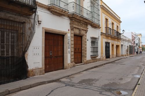 Free Charming street view in El Puerto de Santa María showcasing historic architecture and cobblestones. Stock Photo