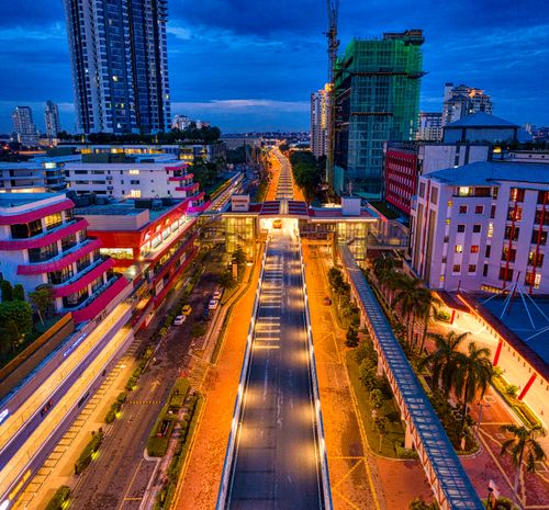 Free A vibrant aerial view of Subang Jaya, Malaysia at night with illuminated streets and urban architecture. Stock Photo
