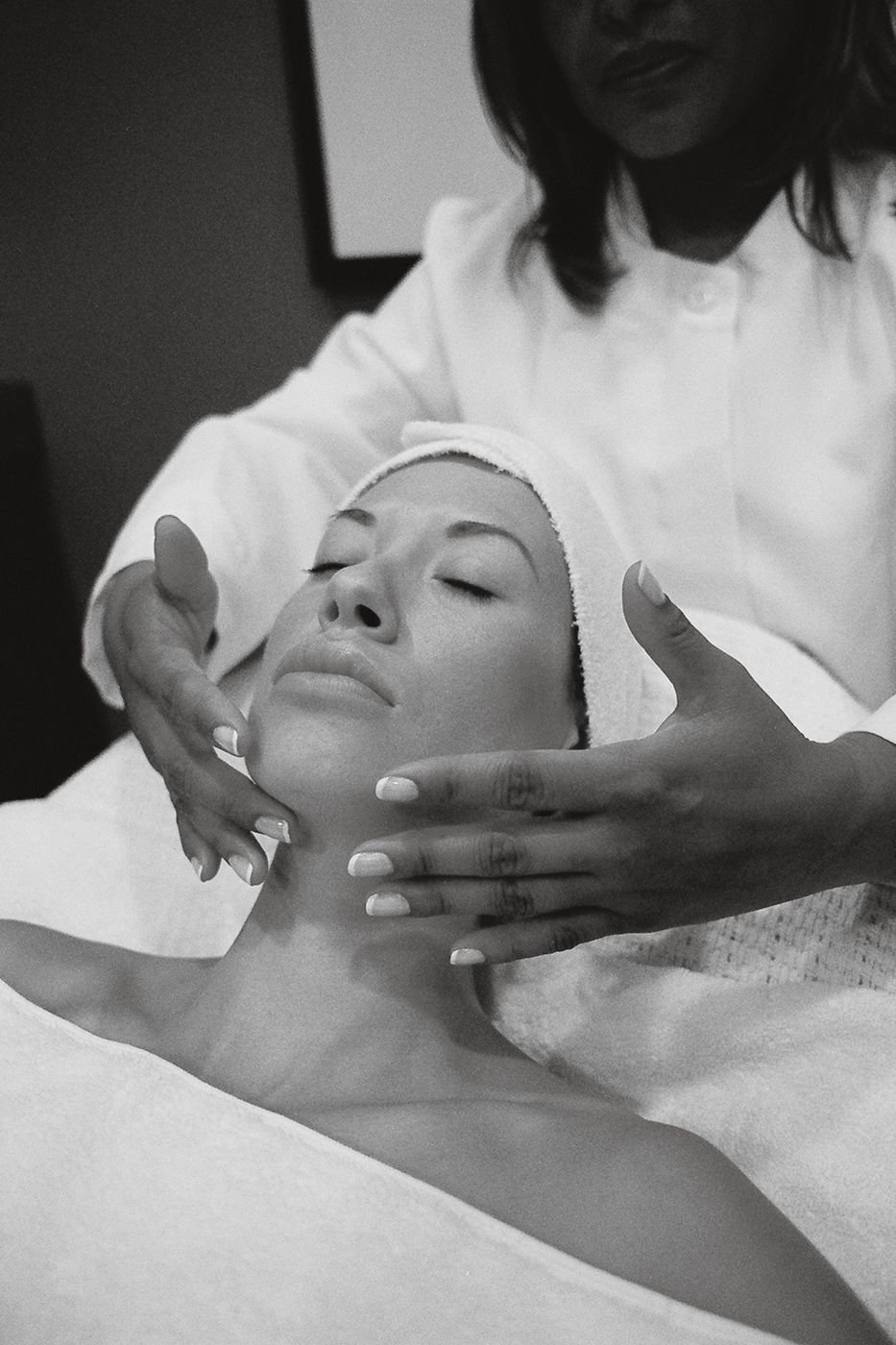 A calm facial treatment, in black and white