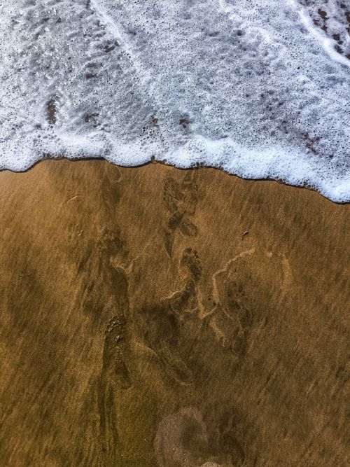Free A gentle wave meets sandy shore in Casablanca, Morocco, capturing serene coastal beauty. Stock Photo