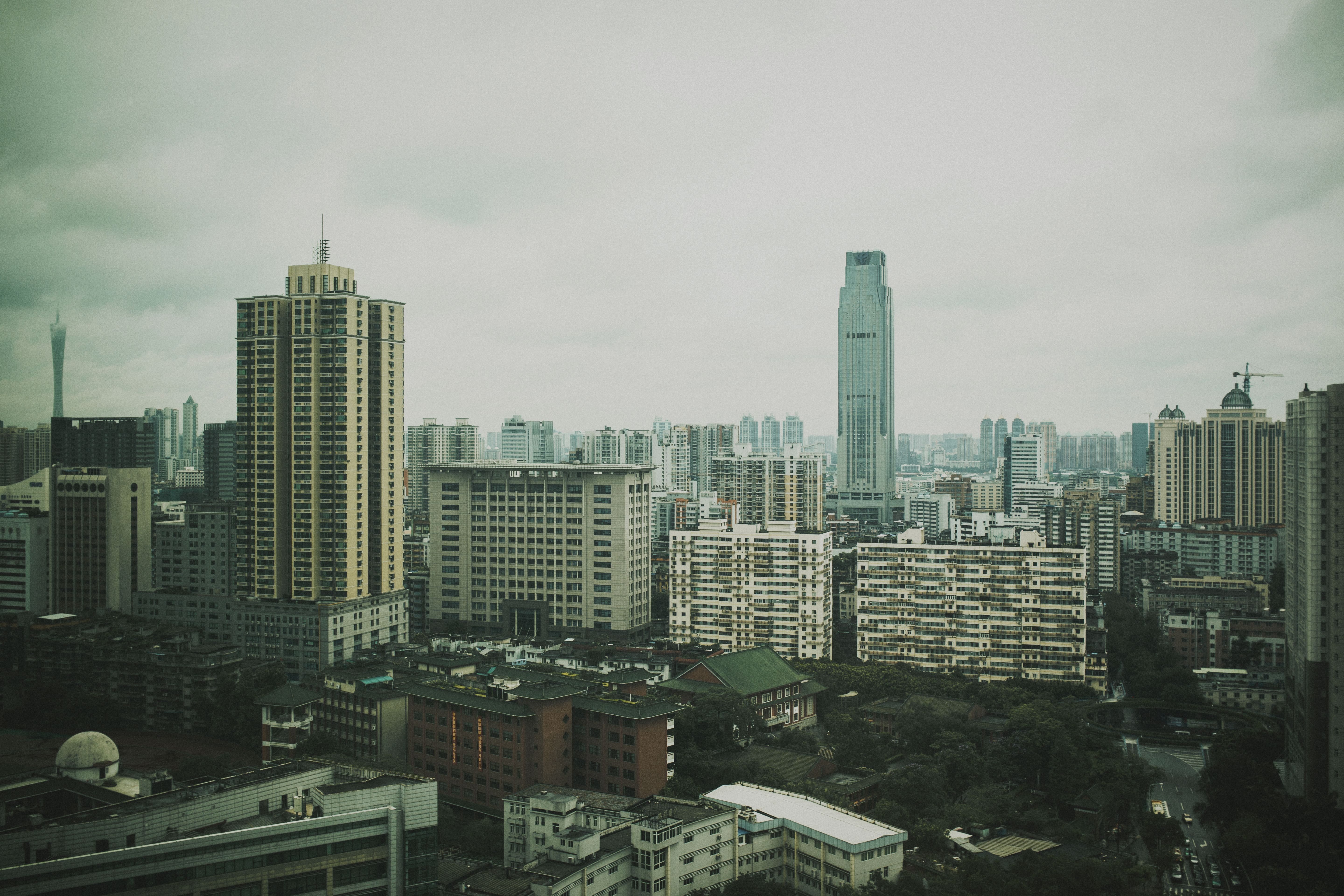 Aerial View of Modern City Skyline with Skyscrapers · Free Stock Photo