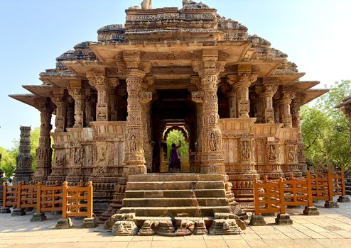 Explore the beautifully carved Modhera Sun Temple in Gujarat, India, showcasing exquisite ancient architecture.