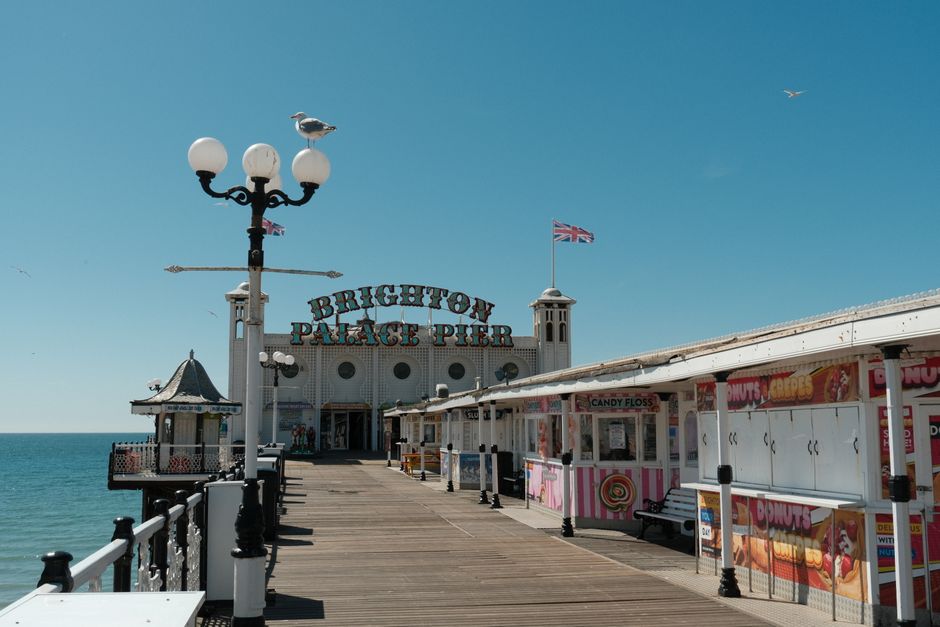 Explore Brighton Palace Pier's charming seaside atmosphere on a sunny day.