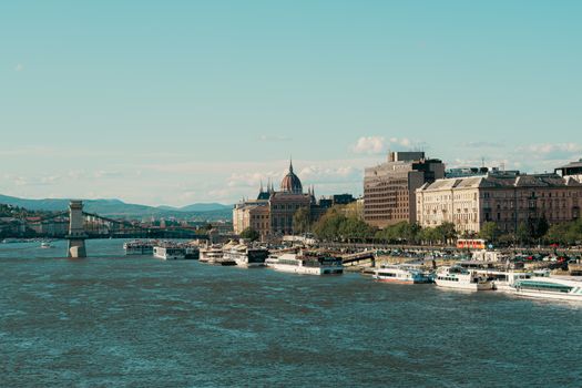 Panoramic view of Budapest's skyline along the Danube with prominent landmarks.