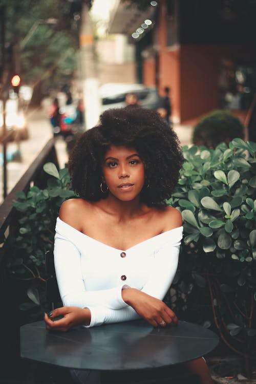 Woman in White  Top Near Green Plants