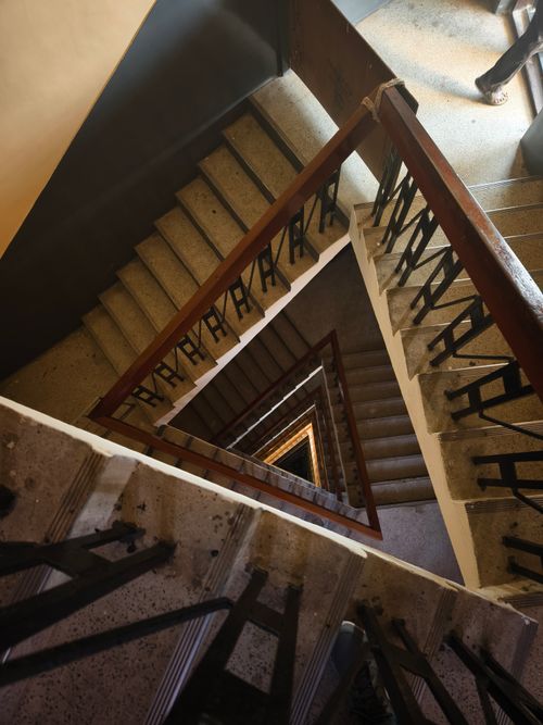 Free Dramatic view of a spiral staircase taken from above in Chennai, India. Stock Photo