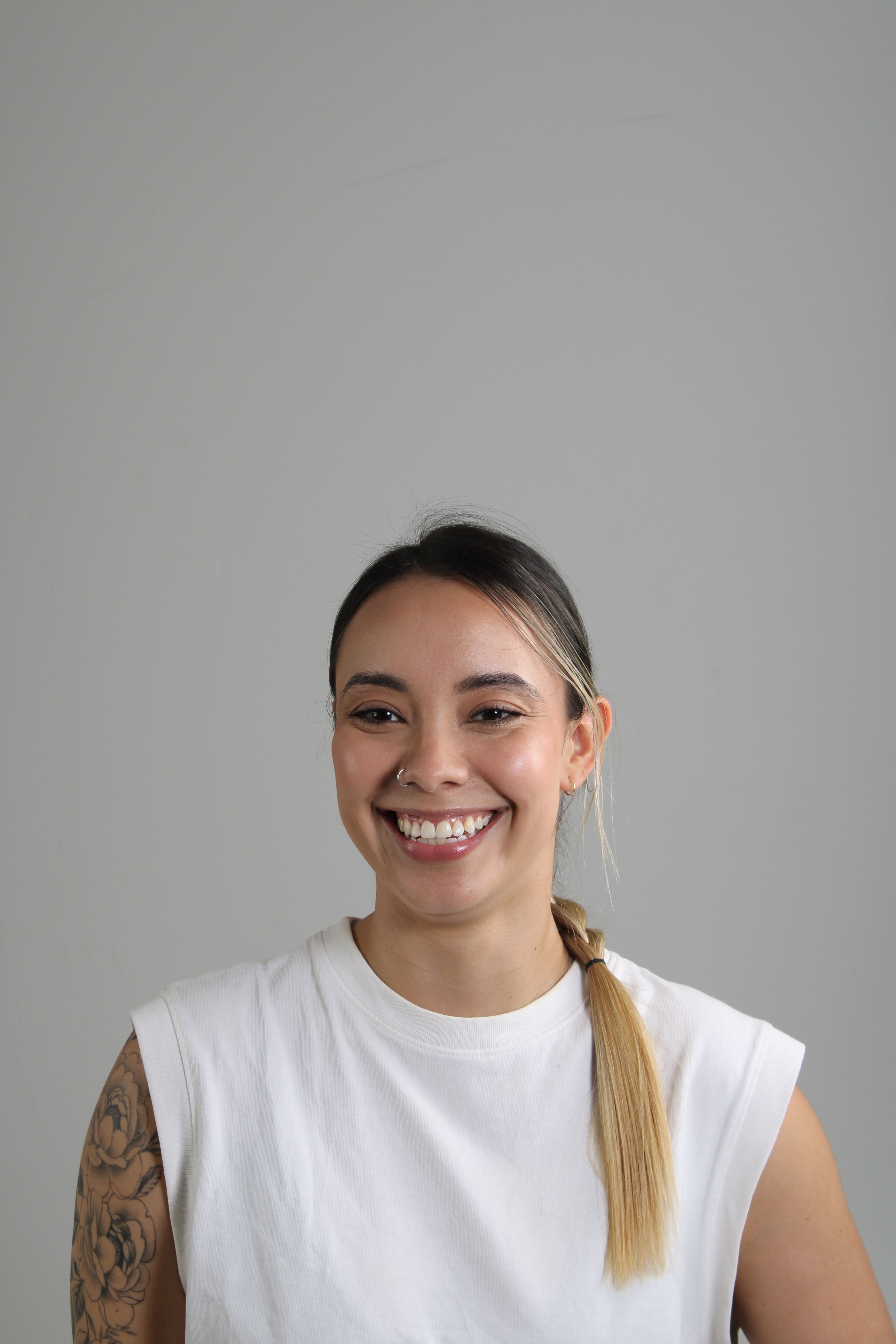 Smiling Woman in Casual White Shirt Portrait · Free Stock Photo