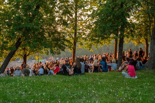 Free A large crowd enjoys live music during a summer evening at Tallinn Song Festival Grounds. Stock Photo