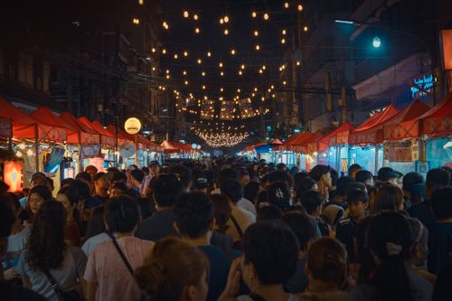 Free Discover the vibrant energy of a bustling night market in Manila, filled with colorful stalls and lively crowds. Stock Photo