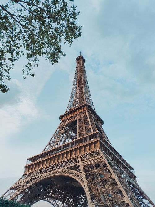 Free Stunning view of the Eiffel Tower against a clear blue sky in Paris, France. Stock Photo