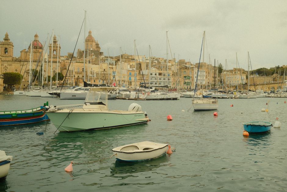 Breathtaking Private Yacht Day Charter Review: Your Ultimate Malta Sea Escape Review 2026 - Discover a picturesque Malta harbor scene with traditional boats and classic architecture.