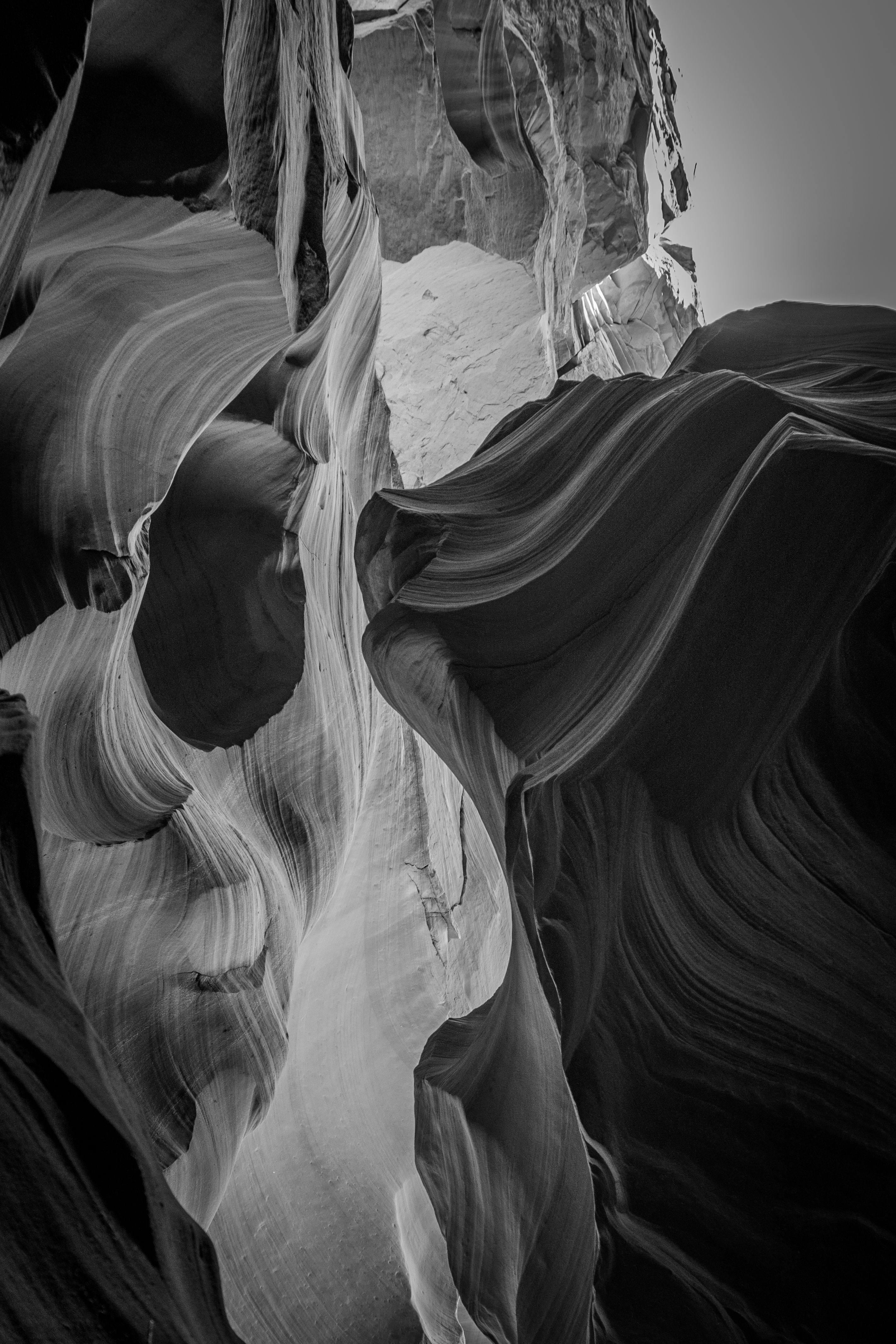 Dramatic black and white abstract textures in Antelope Canyon, showcasing nature's artistry.