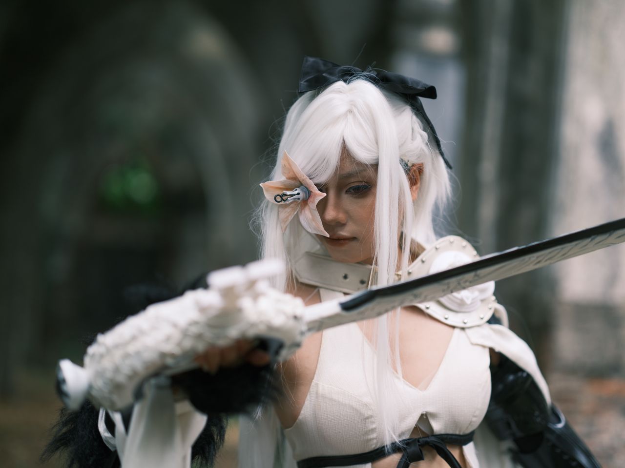 a striking portrait of a cosplayer with sword in an outdoor setting