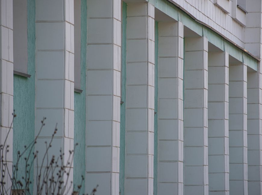 Rows of architectural columns creating a modern geometric pattern.