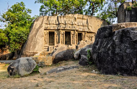 Ancient rock-cut sculptures in Mahabalipuram, Tamil Nadu, India, showcasing historic artistry.