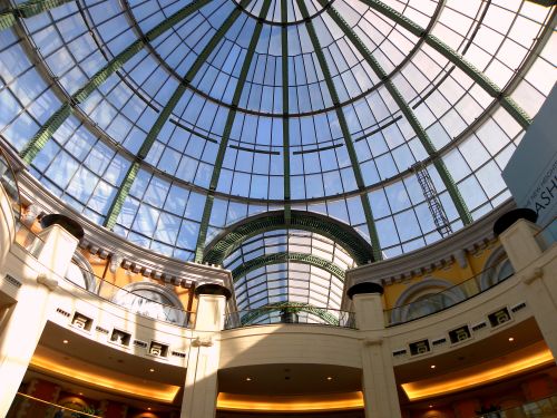 Free Stunning view of the glass dome ceiling inside Mall of the Emirates, Dubai, with sunlight streaming through. Stock Photo