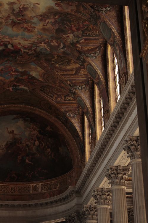 Free Stunning ceiling artwork inside the Palace of Versailles showcasing Baroque grandeur. Stock Photo