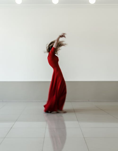 Woman In Red Dress Standing 