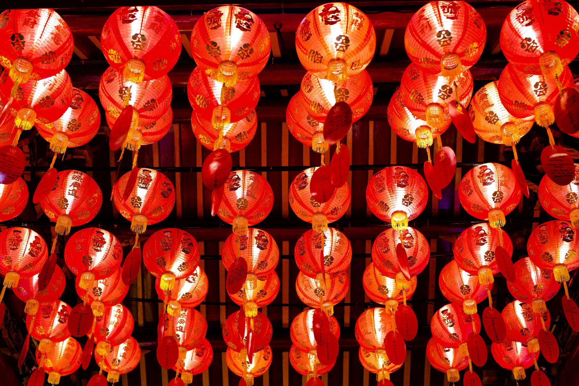 Red lanterns strung across Yaowarat Road during Chinese New Year