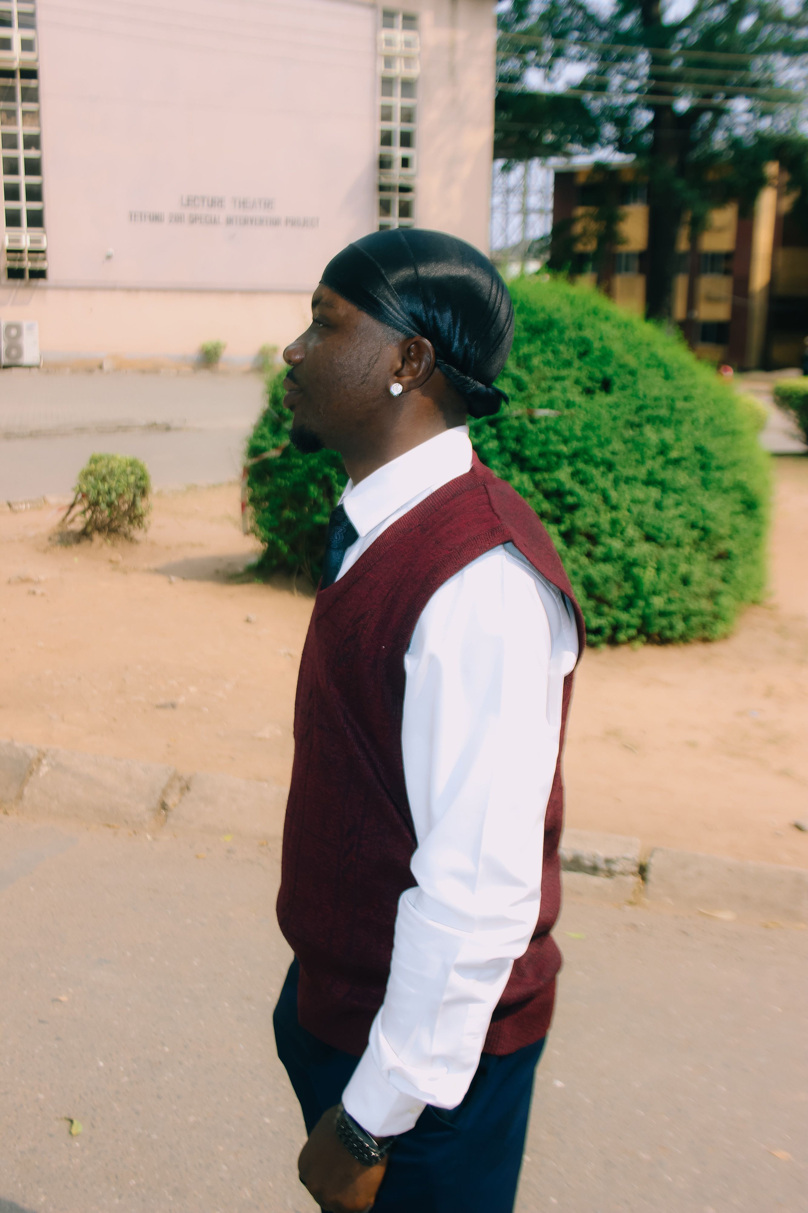 Side View of Man in Formal Attire Outdoors · Free Stock Photo