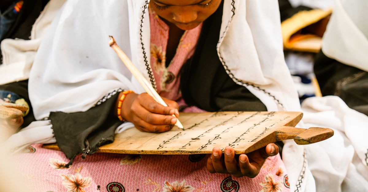 Traditional Write Young Students Engaged in Traditional Writing · Free Stock Photo