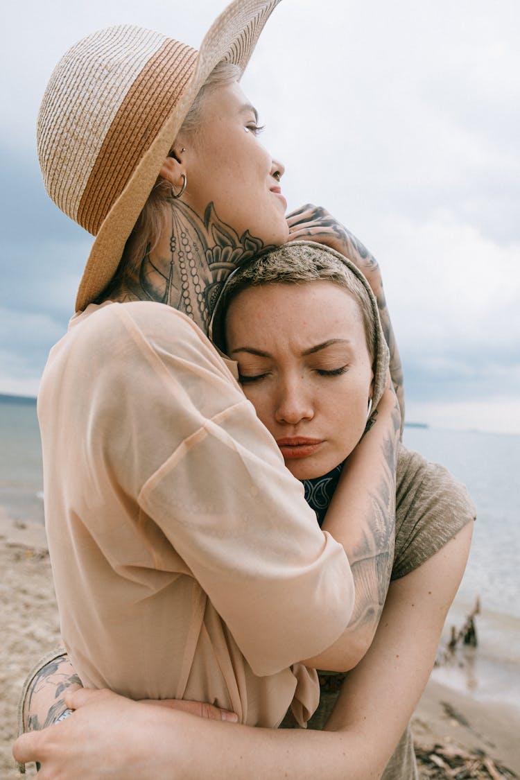 Woman Comforting Friend