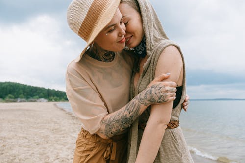 Free Woman Hugging Another Woman Stock Photo