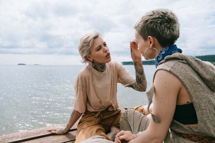 Couple Talking On Beach